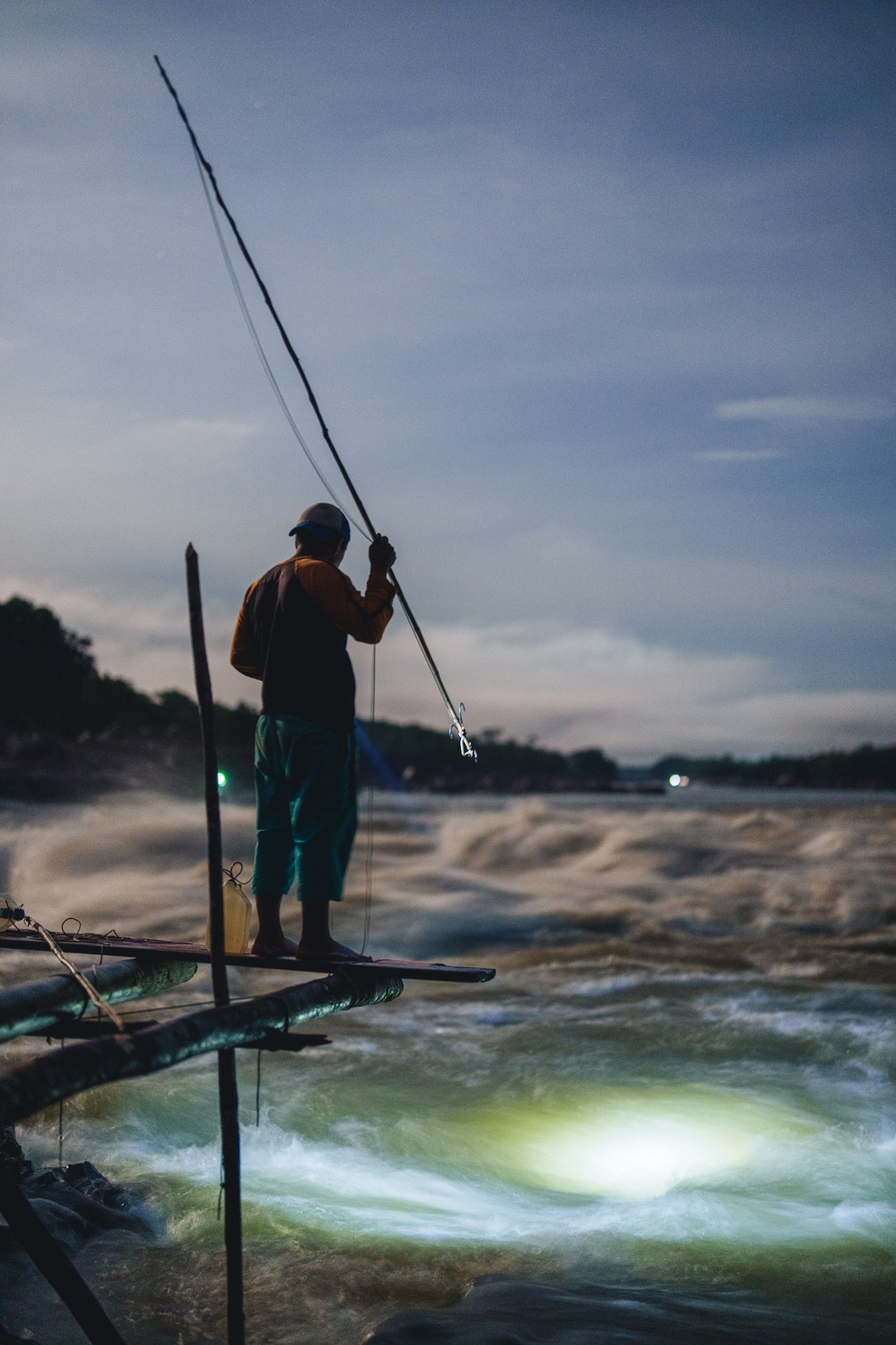fisherman with harpoon in araracuara caqueta colombia