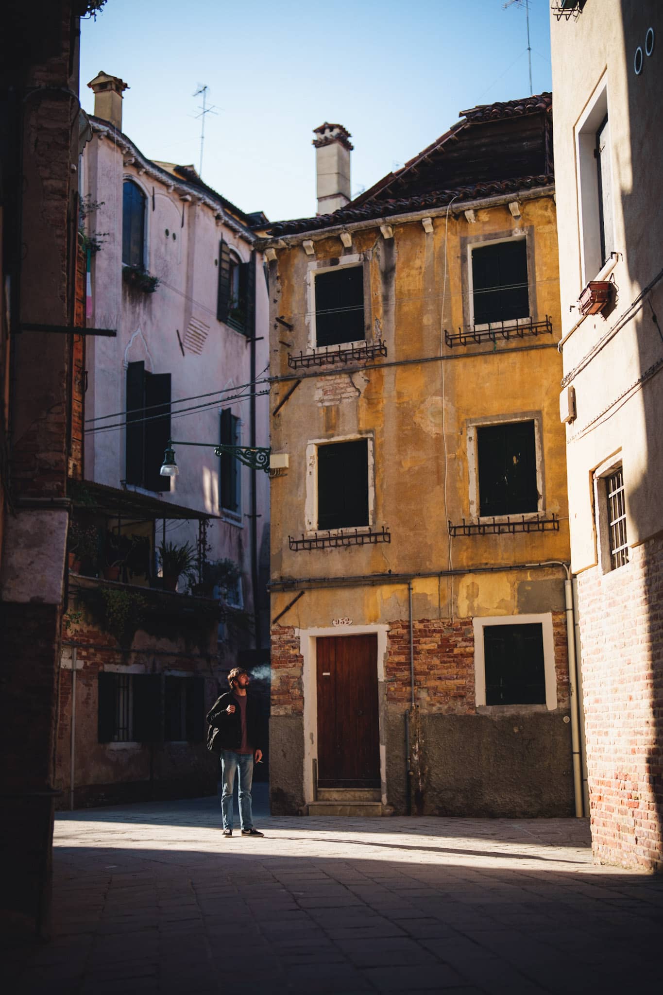 smoking stroller in the sunlight in venice italy